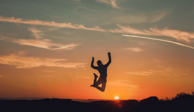 Man jumping in the sunset